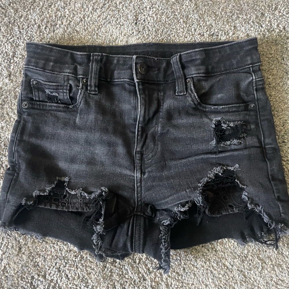 A E Next Level Stretch High Waisted Black Distressed Jean Shorts